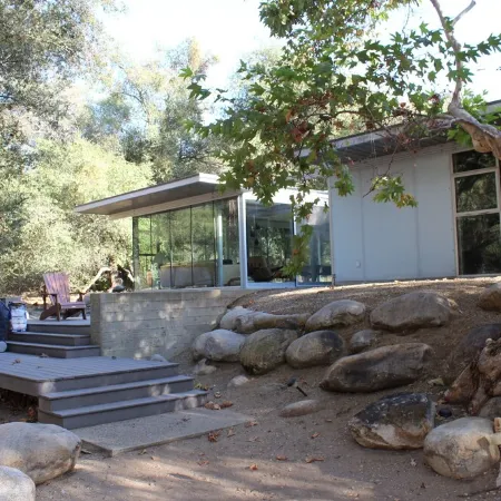 Glass home, with river, night sky & privacy What more can you ask for?