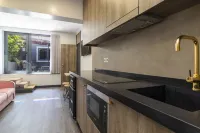 Charm Flats - ห้องครัว