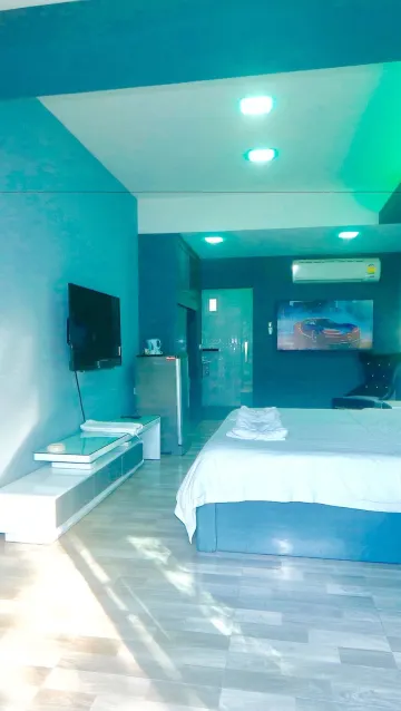 ห้องดับเบิลอีลิท 1 เตียงคิงไซส์ เชื่อมกับสระว่ายน้ำ ริมสระว่ายน้ำ