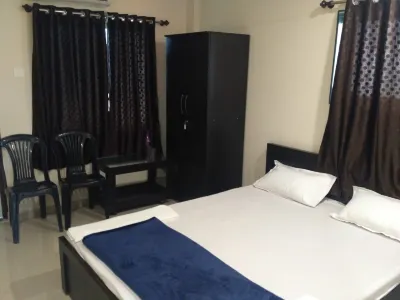Hotel Honey Lodging Hotels near ISKCON NVCC Temple