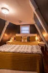 Cozy 2-bedroom Aframe in charming Lake Geneva with a hot tub and fireplace