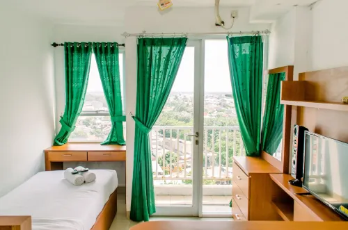 Cozy and Comfort Studio Room at Poris 88 Apartment