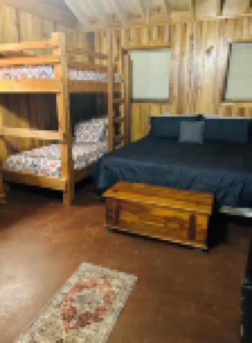 Fully restored cabin, 150 years old, nestled on Lookout Creek Farms