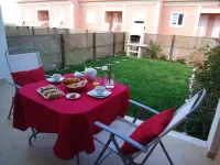 Charming and modern apartment with private garden near the beach of São Julião