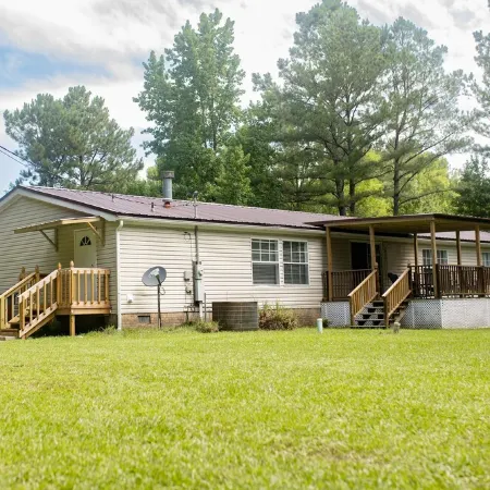 Quiet country living in a newly remodeled mobile home on 1.5 acres - 7 mi to MSU