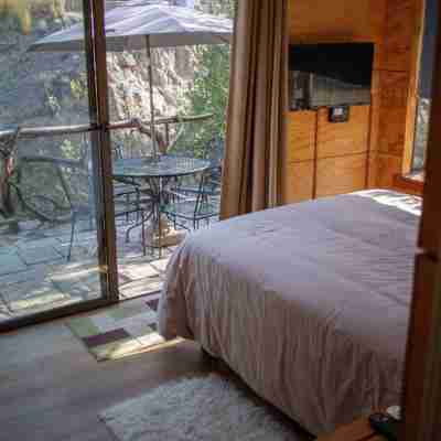 Ñilhue house with forest and river Rooms