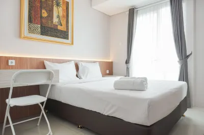 Comfortable and Minimalist Studio Apartment at Woodland Park Residence Hotels in Kramat Jati