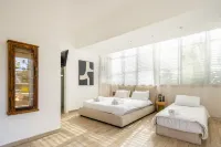Stylish 3BR Apt w Balcony 5 min Walk from Beach Hotels in 