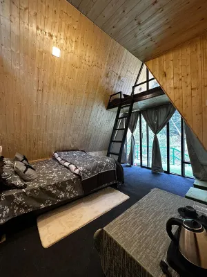 Sunshine Cafe & Cottage Riverside Hotels in Rashala