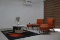 Spacious 9-bedroom apartment in delightful Spintex Road with AC, WiFi Hotels in Sakumono