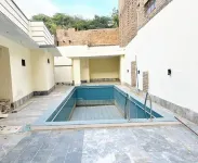 Charming 2-bedroom bungalow with WiFi and AC in lovely Sukkur plus Swimming Pool Hotels in Sukkur