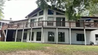 What a family lake house should be! Natural Beauty w/ space for each to enjoy!!!