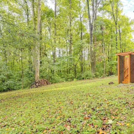 Soak in Hot Tub, Explore Outdoors: Cleveland Cabin