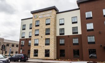 "a brick building with the words "" cobblestone hotel & suites "" prominently displayed on the front" at Cobblestone Hotel & Suites - Chippewa Falls