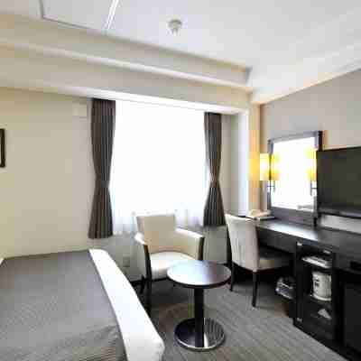 西条アーバンホテル Rooms