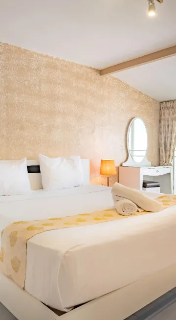 ห้องดีลักซ์พร้อมระเบียงและวิวมหาสมุทร(เตียงใหญ่)