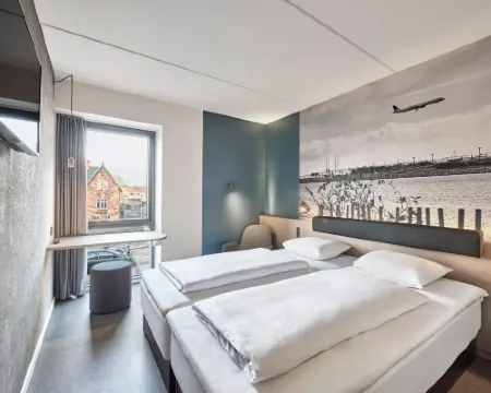 フォー ポインツ エクスプレス バイ シェラトン コペンハーゲン エアポート カストルプのホテル