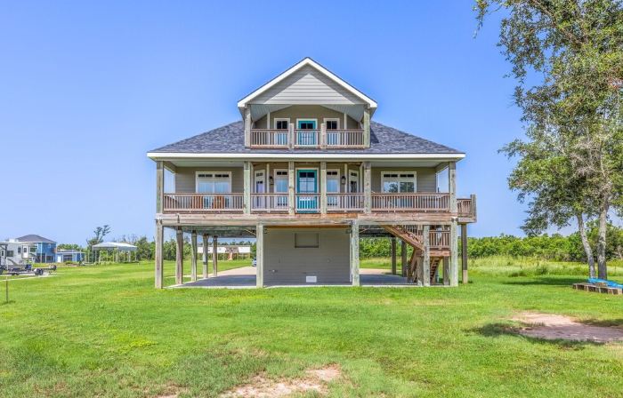REEL N  REST in Hackberry LA ! Waterfront home with beautiful views .