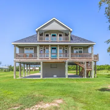 REEL N  REST in Hackberry LA ! Waterfront home with beautiful views .