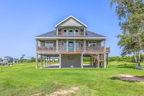 REEL N  REST in Hackberry LA ! Waterfront home with beautiful views .