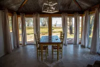 House on the lake with a large sandy beach just steps from the back door.