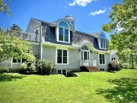 Exclusive Oyster Pond Retreat with Private Beach Access and New Gourmet Kitchen