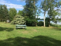 Ferguson Farmhouses on Oak Lake with 176 feet of shoreline in Kerrick Minnesota.
