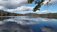 Vacationer's oasis on the waterfront of picturesque Pearly Pond.