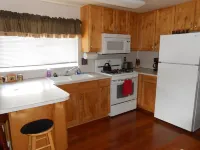 The Pinecone Cabin is a small cozy cabin in the heart of West Yellowstone, MT.