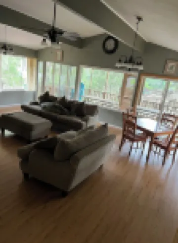 Two Story House with Deck over the River