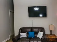 Renovated Suite with 1 queen bed and a Twin. Kitchen & bath for your privacy.