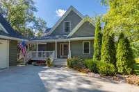 "Home Away From Home" nestled into five private acres on an all sports lake!