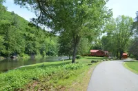 Spectacular Catskill Mountain River Front Custom Log Home