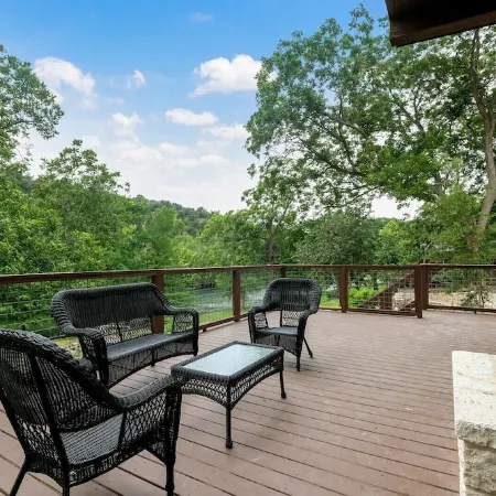 Modern River Home on 1/2 Acre with 101' of Private River Frontage.