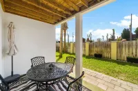 Stunning Beachside Townhouse with Pool, 2 Car Garage and Lagoon Access