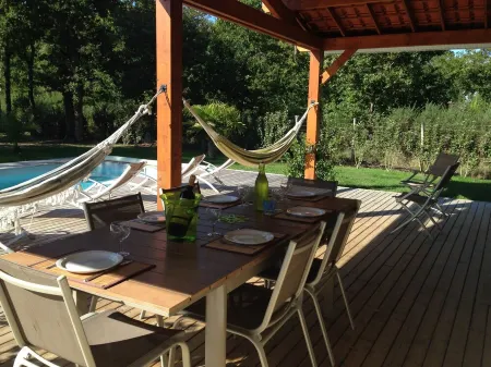 Holiday home with heated swimming pool