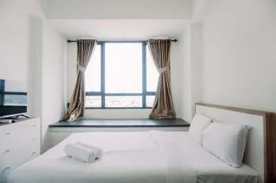 Homey and Comfort Living Studio Collins Boulevard Apartment Hotell i Panunggangan