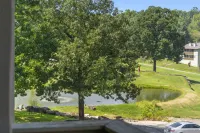 Balcony View and Golf Course Access - Stylish Escape Hotels in Oliver Township