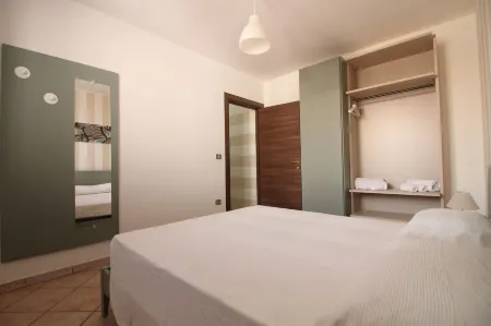 Residence Mare Azzurro Отели в г. Torre San Giovanni Ugento