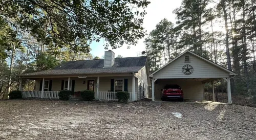 Our Happy Place is located in the gated community of Holly Lake Ranch.