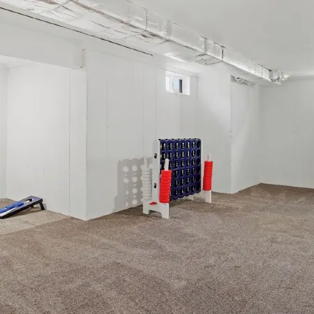 Ideally located, game room, finished basement, fenced yard, lawn games, coffee