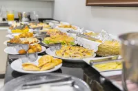 Hotel Guapindaia Praça - servizio colazione