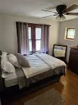 Charming 2-bedroom, cozy bungalow with sunroom in fabulous St. Louis with WiFi Hotels near CVS