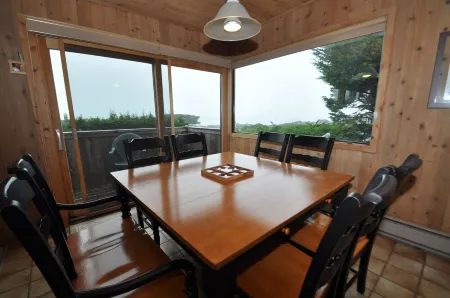 4.5 Bedrooms, 3 Baths, 2 Kitchens, 180 degree views and a 'Man Cave'