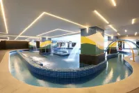 Penthouse Studio in the biggest Fitness & Family Complex - Fast Wifi/Netflix!