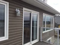 Main Floor (Unit 1) in House, Deck, Sunset, Water View (Cheticamp Harbour) Hotels in Cheticamp