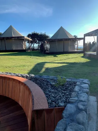Te Whaanga Retreat & Spa Отели в г. Раглан