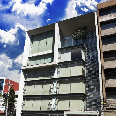 Suites Aura for Living Hotels near Poliforum Siqueiros