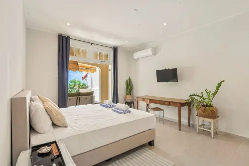 Royal Beach House with sea view and large community pool.