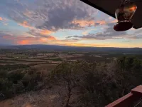 Home on the mesa’s edge the Proverbial Million Dollar View, jacuzzi and orchard